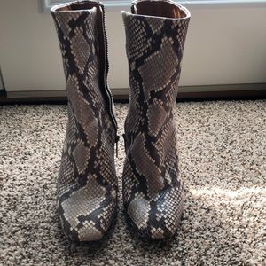 Snake skin mid-calf boots